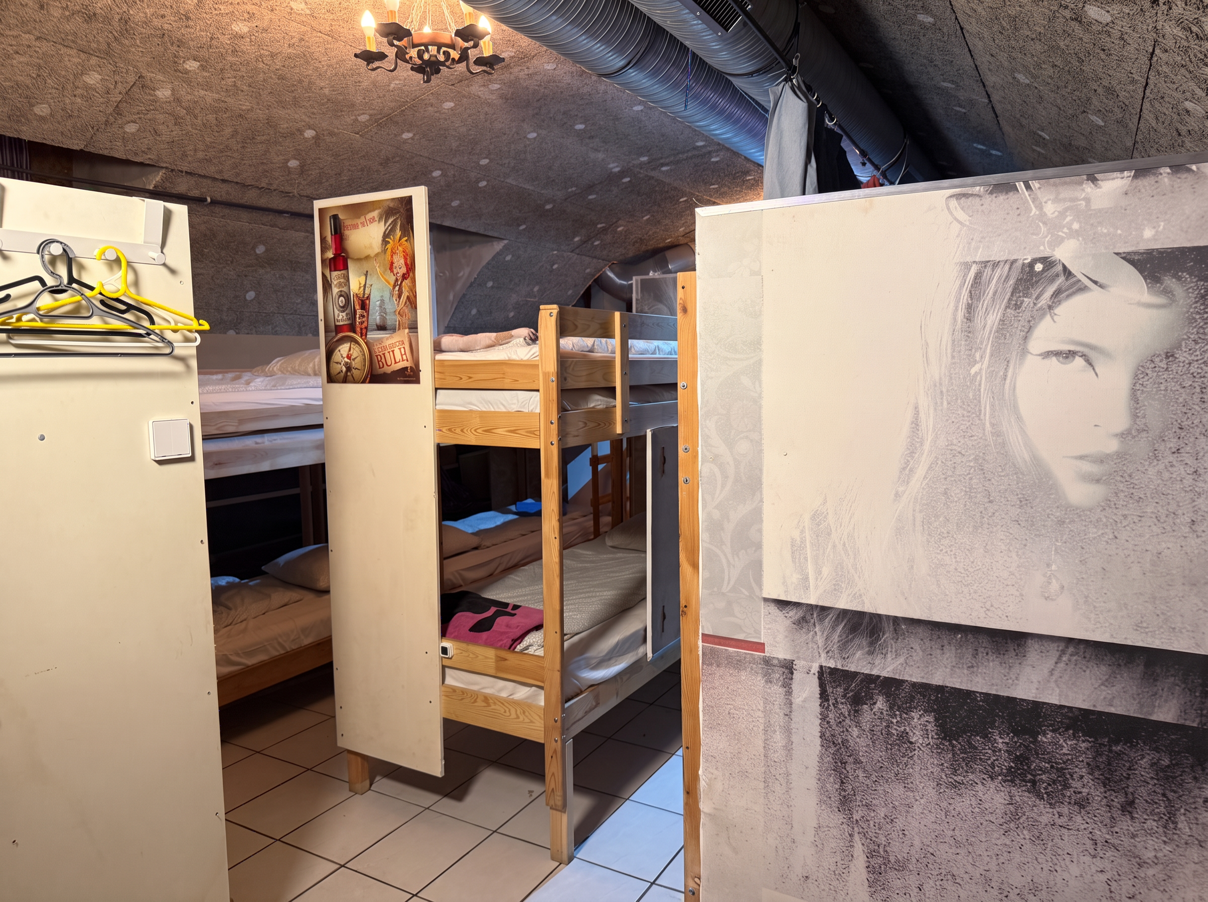 Sleeping area with coat hangers and storage panels